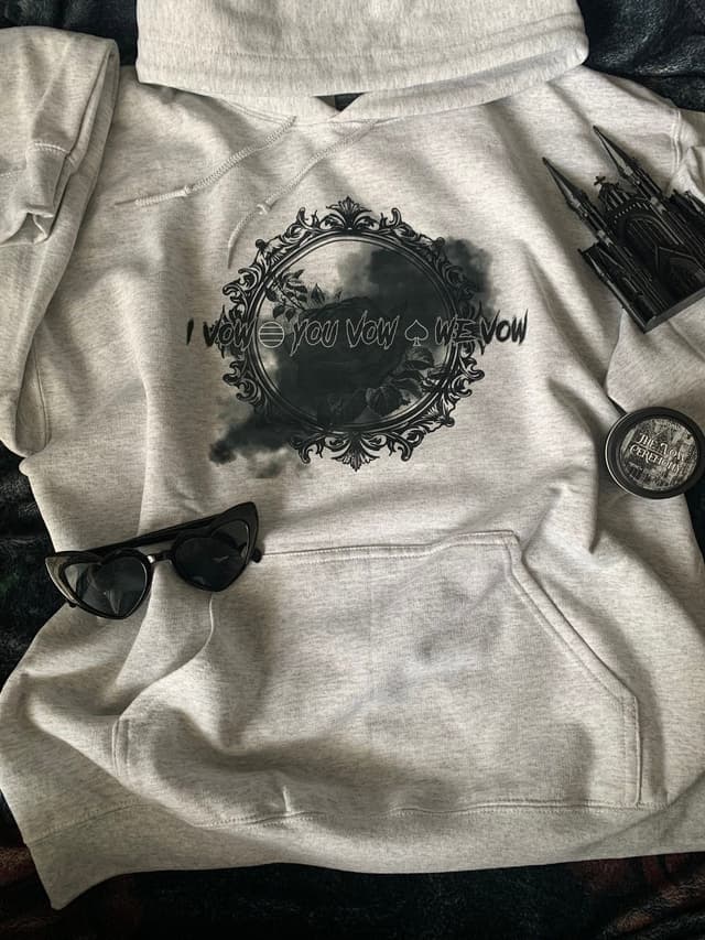 Heather gray I vow you vow we vow hoodie with ornate rose frame, heart sunglasses, and The Vow Ceremony candle