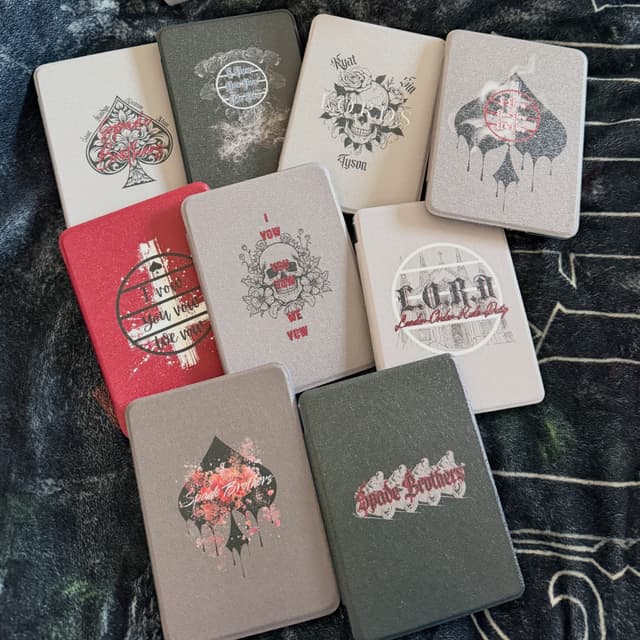 Collection of custom Lords Series Kindle cases with Spade Brothers, LORA, and I vow you vow we vow designs